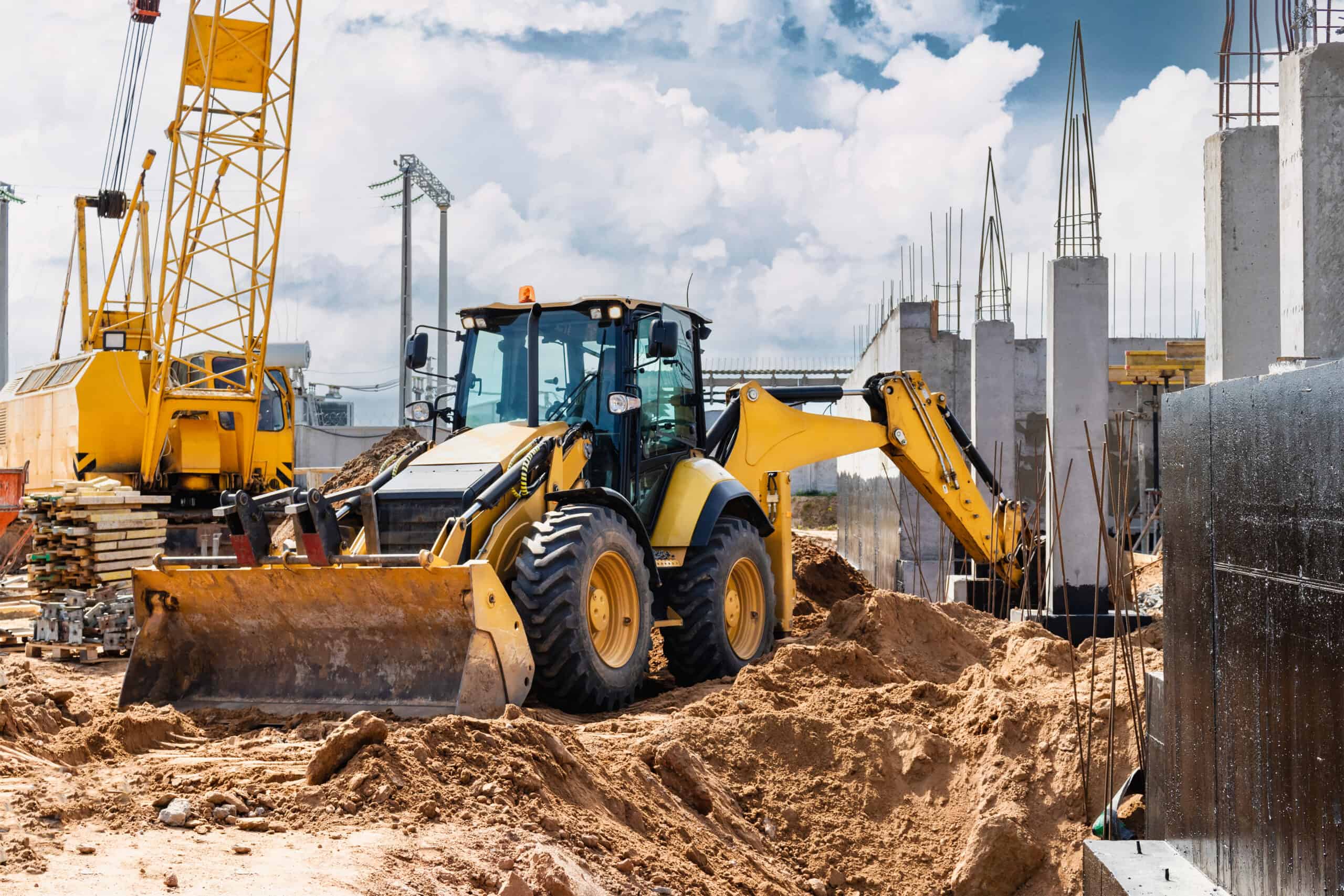 Heavy machinery at a construction site emphasizing infrastructure development.